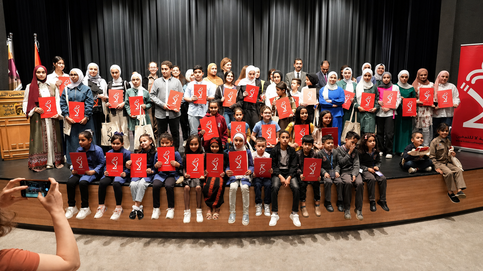 Children and supporters gathered at a Tobacco Free Jordan community event